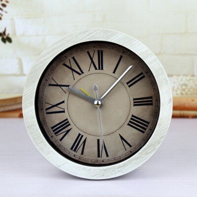 Mały okrągły zegar stołowy w stylu retro