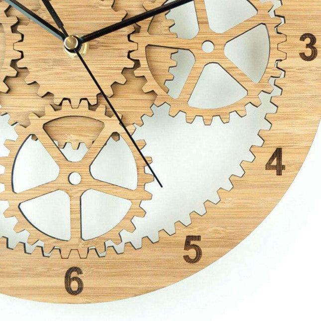 Zegar ścienny z ruchomymi kołami zębatymi