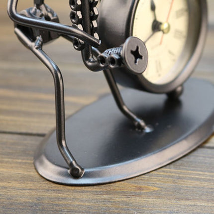 Metalowy zegar na biurko z figurką