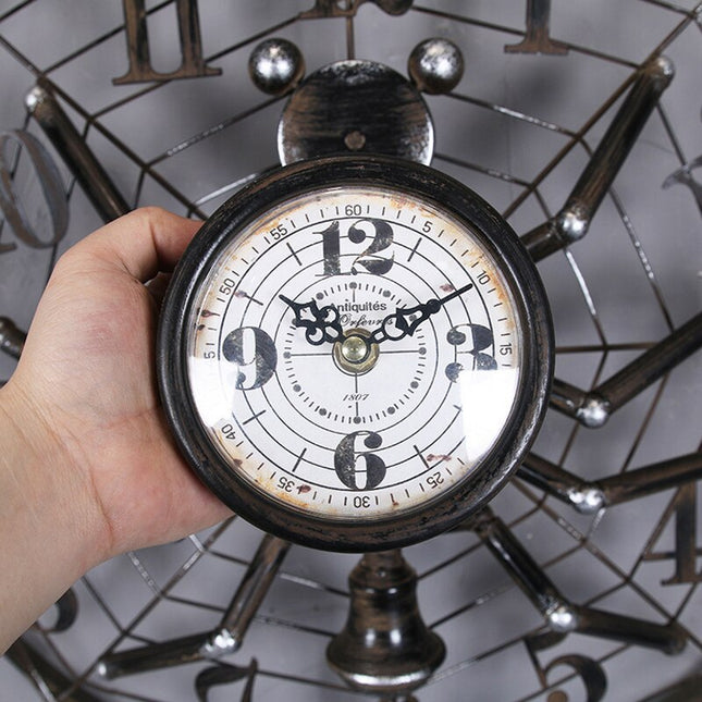 Industrialny zegar ścienny w kształcie pająka