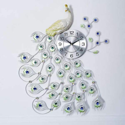 Srebrny zegar ścienny w kształcie pawia
