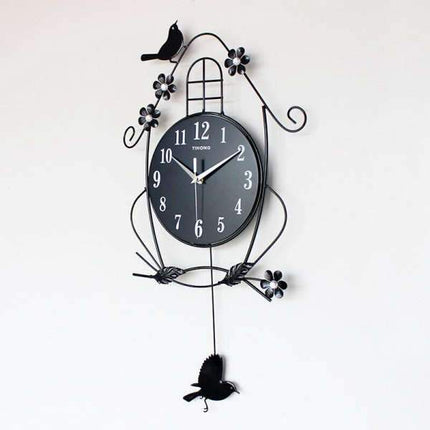 Zegar ścienny z ptakami i wahadłem