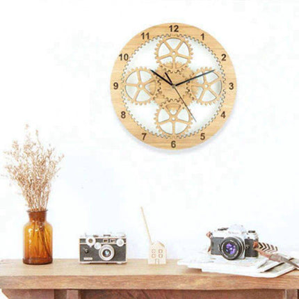 Zegar ścienny z ruchomymi kołami zębatymi